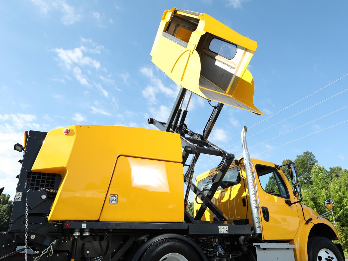 e35m-yellow-hopper-tilted-and-raised-close-up.jpg?itok=m3M5H9WL